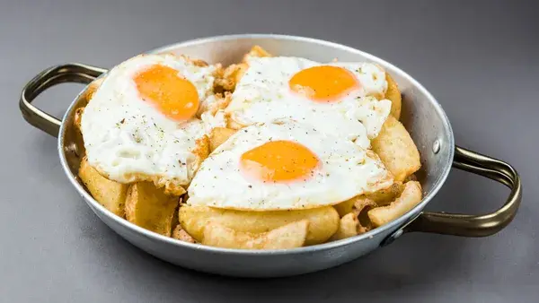 French Fries with egg and feta cheese